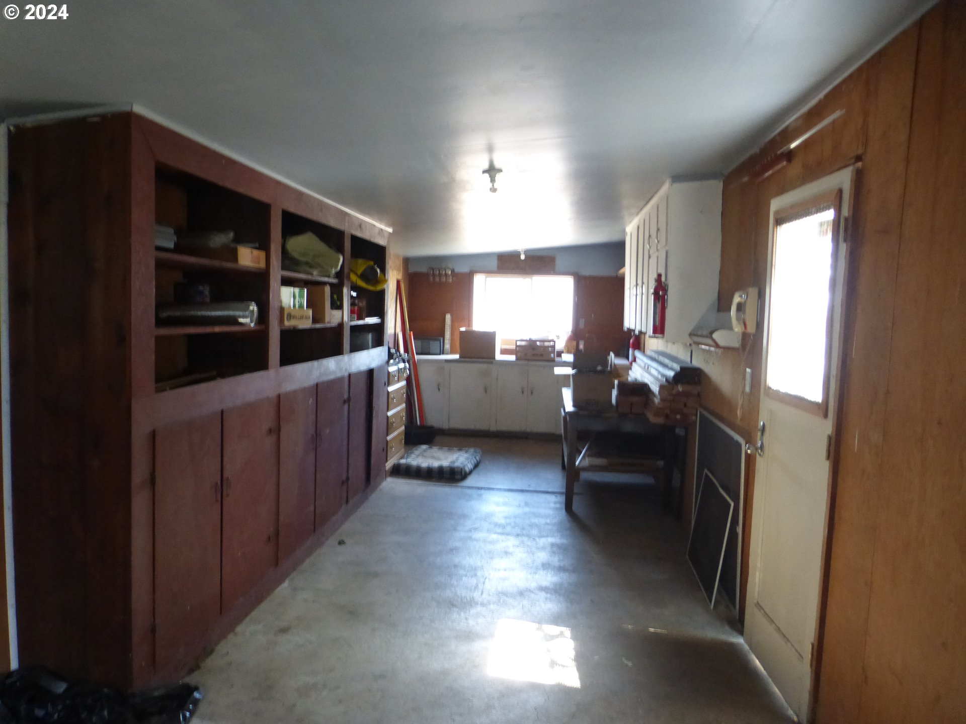 1026 M Street Springfield, OR 97477 - Photo 19 of 20 a kitchen with counter top space and windows