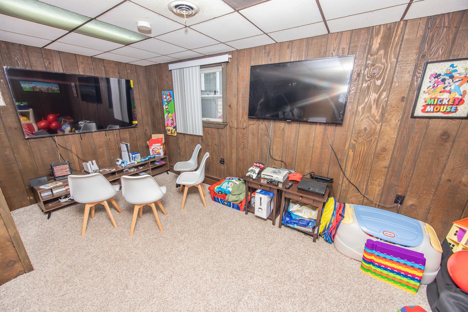 613 Westnedge Road Joliet, IL 60435 - Photo 24 of 33 a living room with furniture and a flat screen tv
