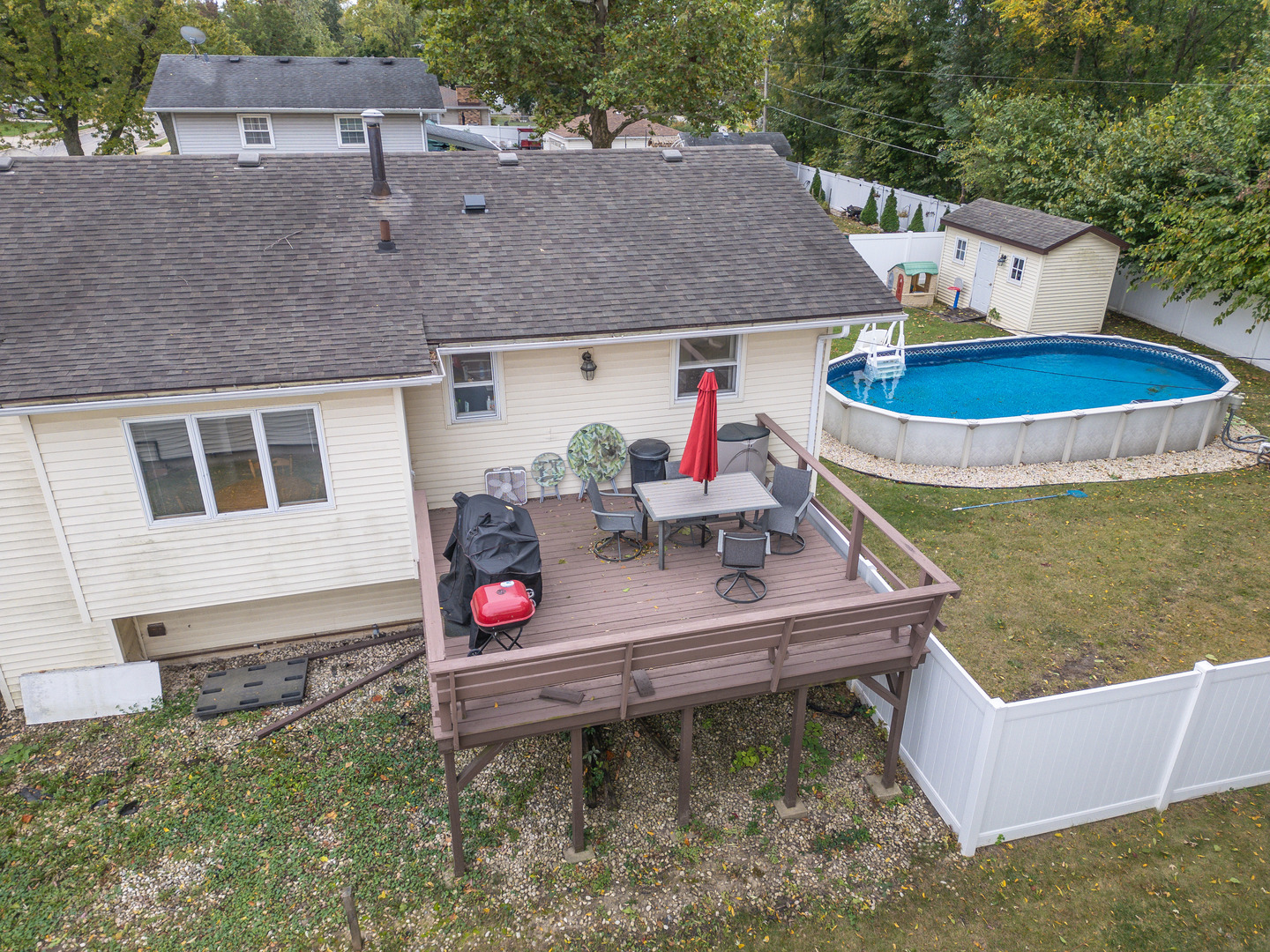 613 Westnedge Road Joliet, IL 60435 - Photo 26 of 33 a view of house with pool yard and outdoor seating