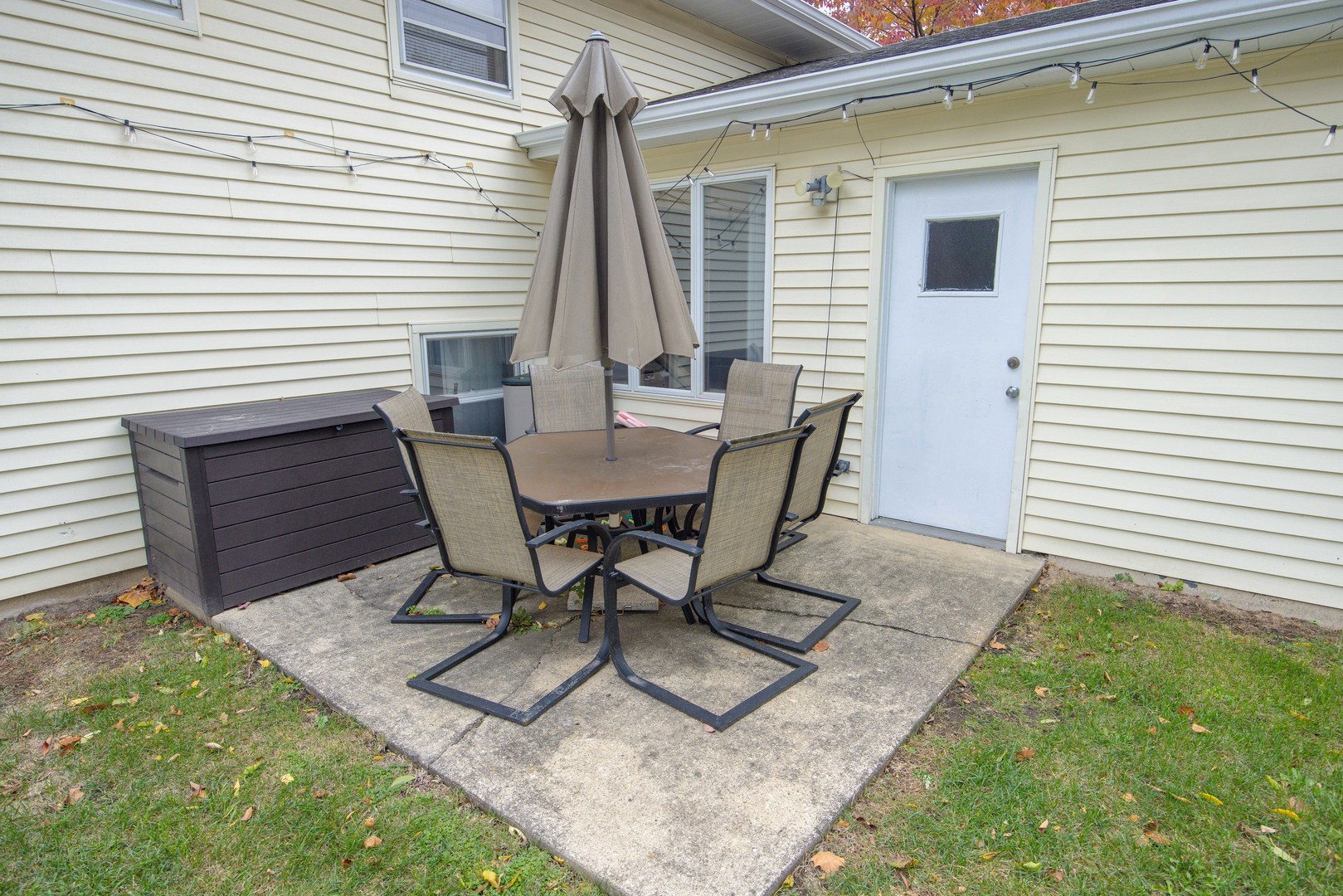 613 Westnedge Road Joliet, IL 60435 - Photo 27 of 33 a view of a backyard with a sitting area and furniture