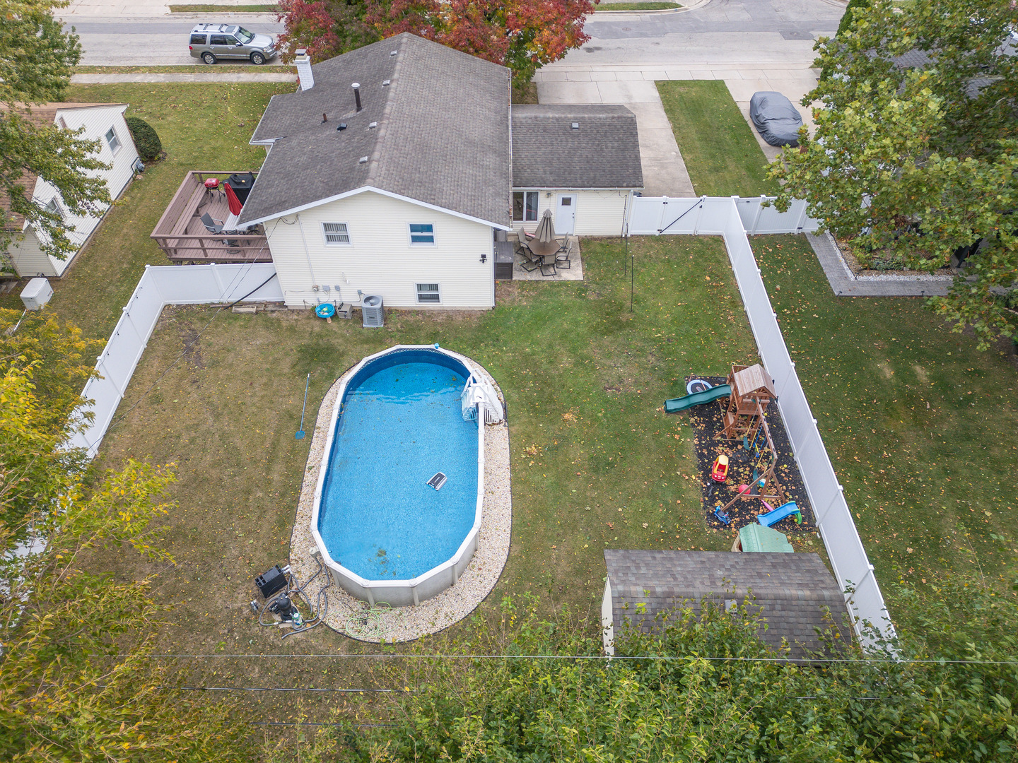 613 Westnedge Road Joliet, IL 60435 - Photo 32 of 33 an aerial view of a house with swimming pool garden and mountain view