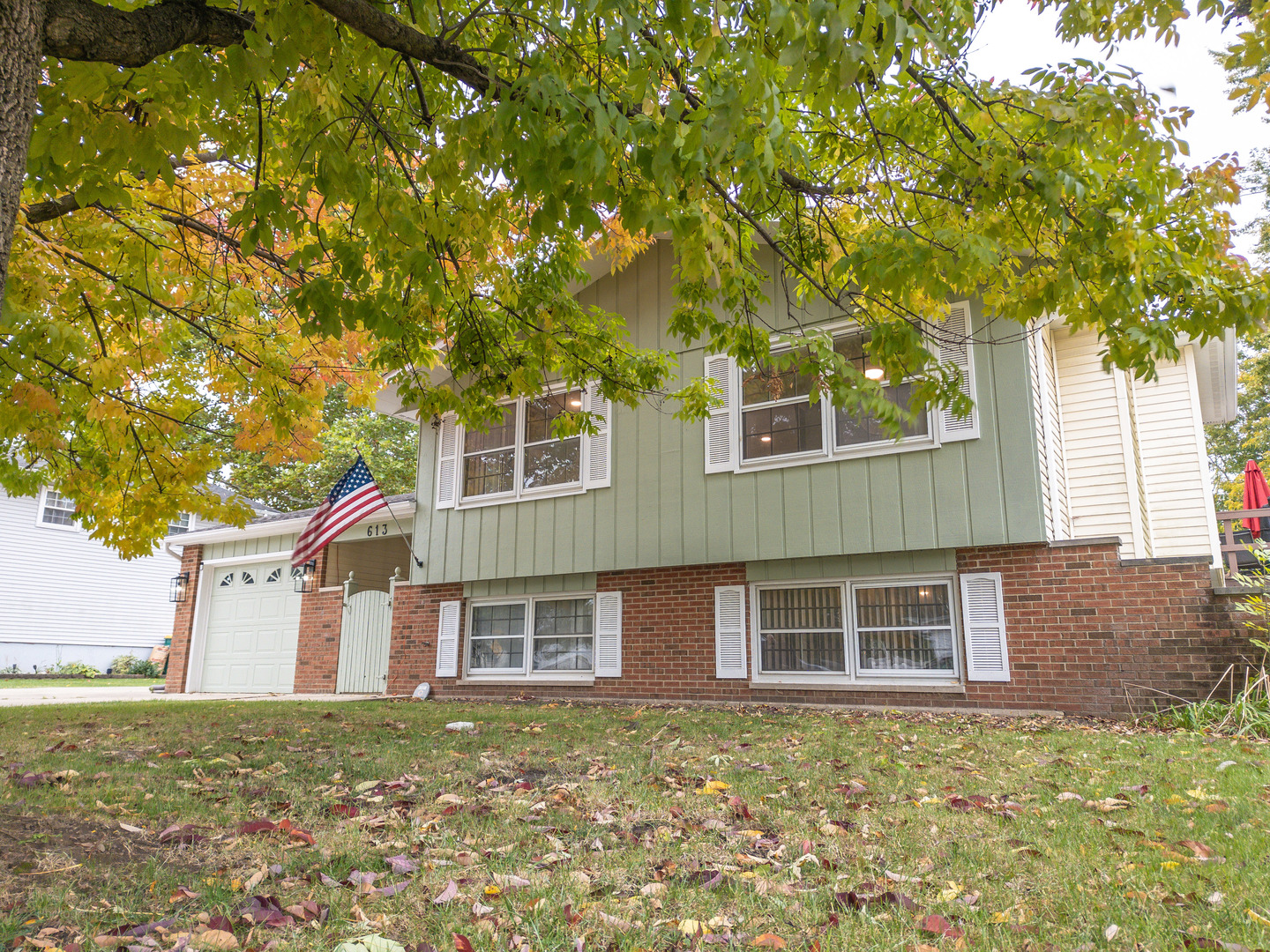 613 Westnedge Road Joliet, IL 60435 - Photo 33 of 33 a house that has a tree in front of the house