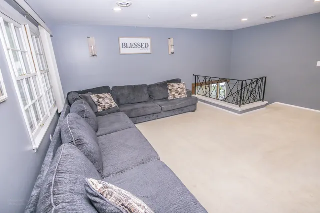 a living room with furniture and a couch