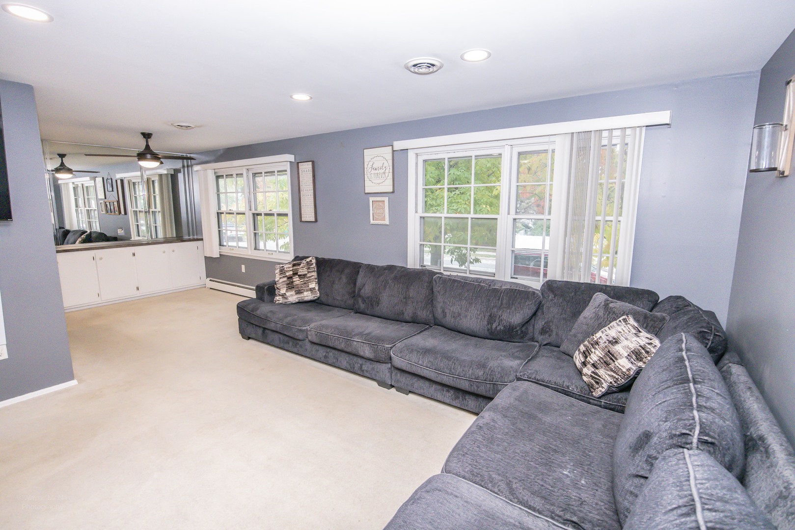 613 Westnedge Road Joliet, IL 60435 - Photo 8 of 33 a living room with furniture and windows