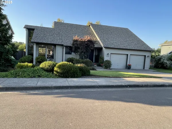 a view of a house with a swimming pool