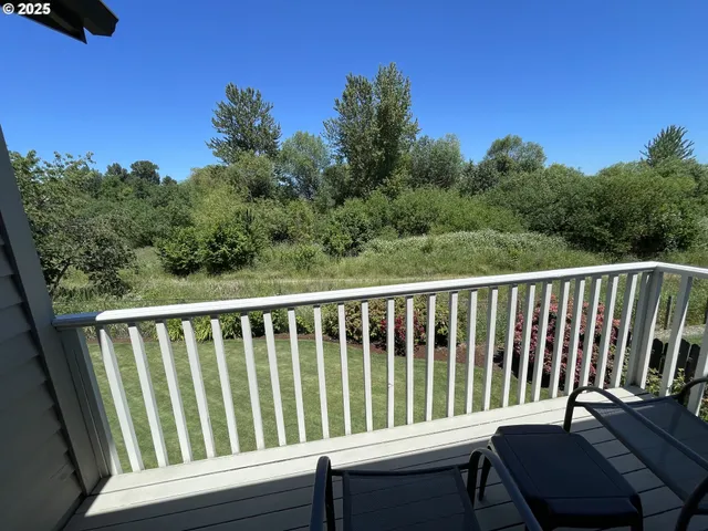 a view of a chair in a balcony