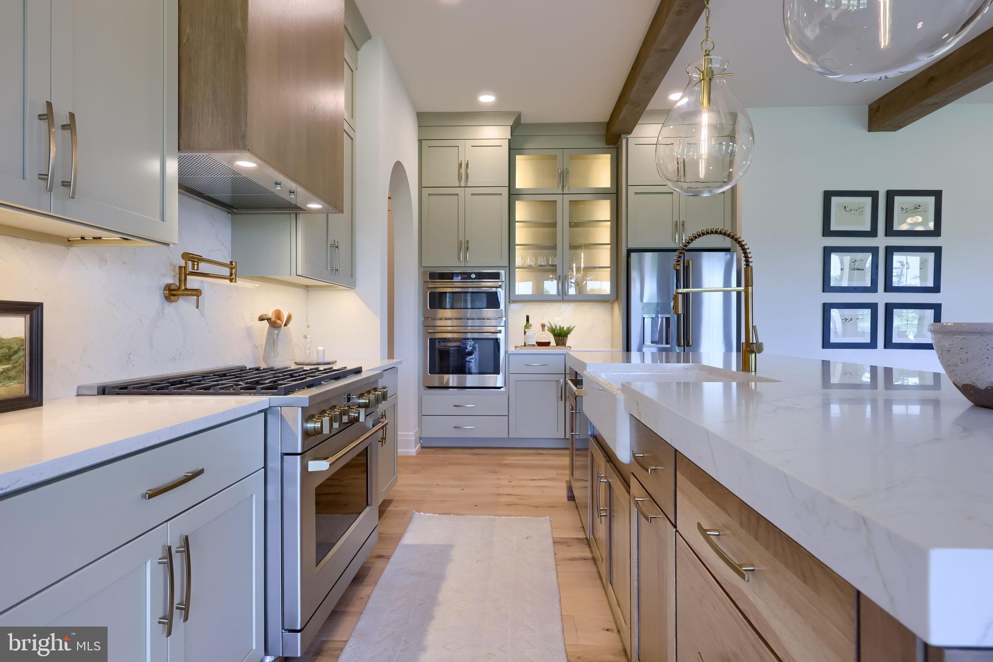 3 Balsam Lane Lititz, PA 17543 - Photo 19 of 52 a large kitchen with stainless steel appliances granite countertop a lot of counter space and a sink