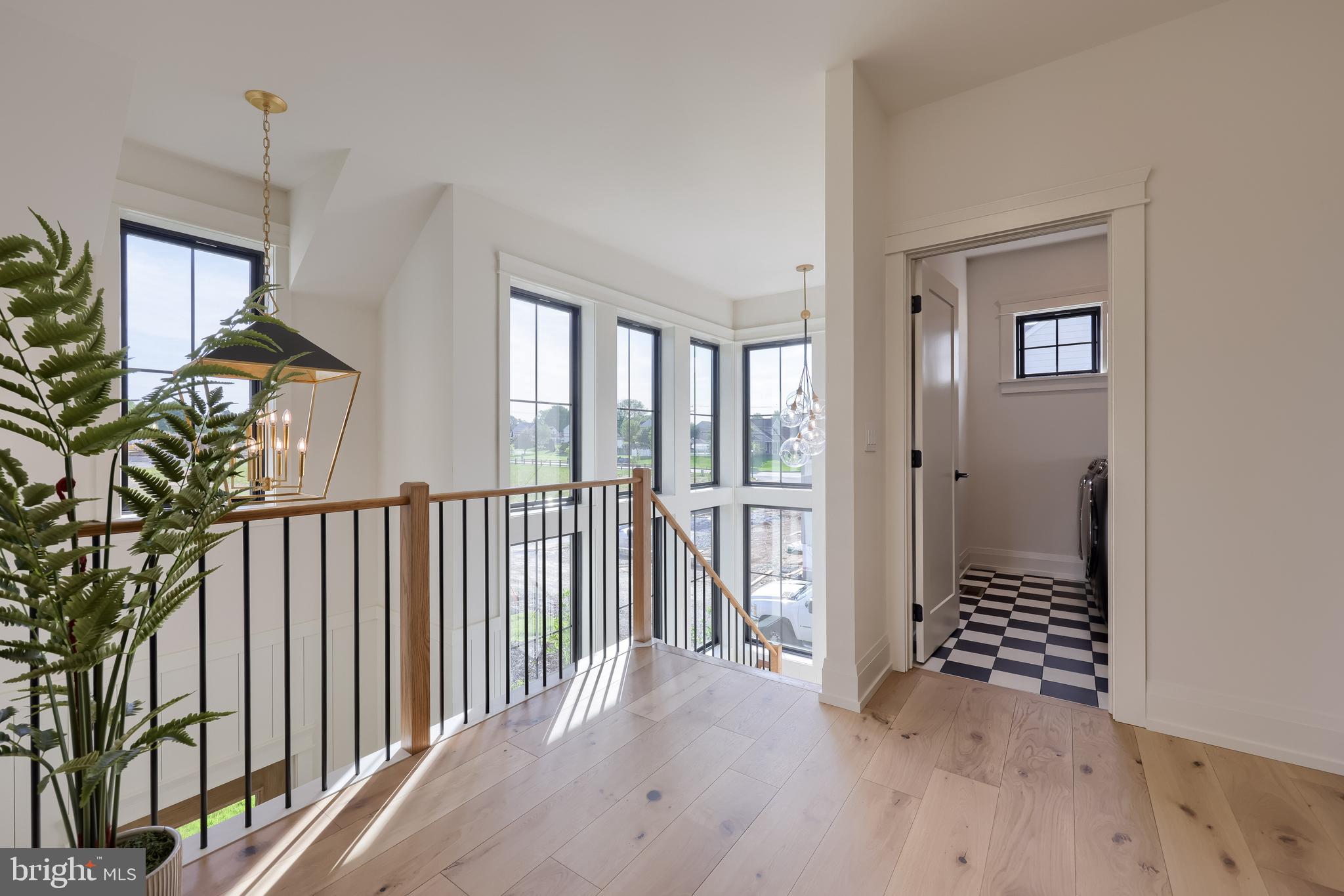 3 Balsam Lane Lititz, PA 17543 - Photo 32 of 52 a view of a hallway view with wooden floor and staircase