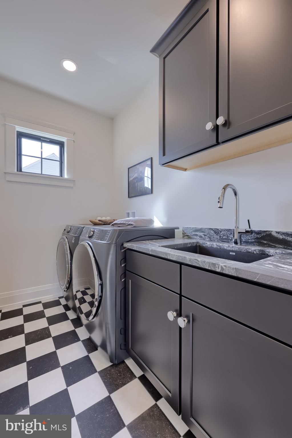 3 Balsam Lane Lititz, PA 17543 - Photo 34 of 52 a kitchen with a sink a refrigerator and cabinets