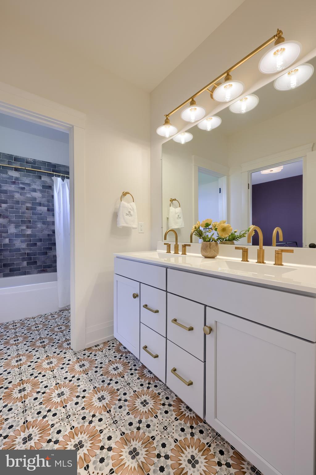3 Balsam Lane Lititz, PA 17543 - Photo 37 of 52 a bathroom with a sink a vanity and a light fixture