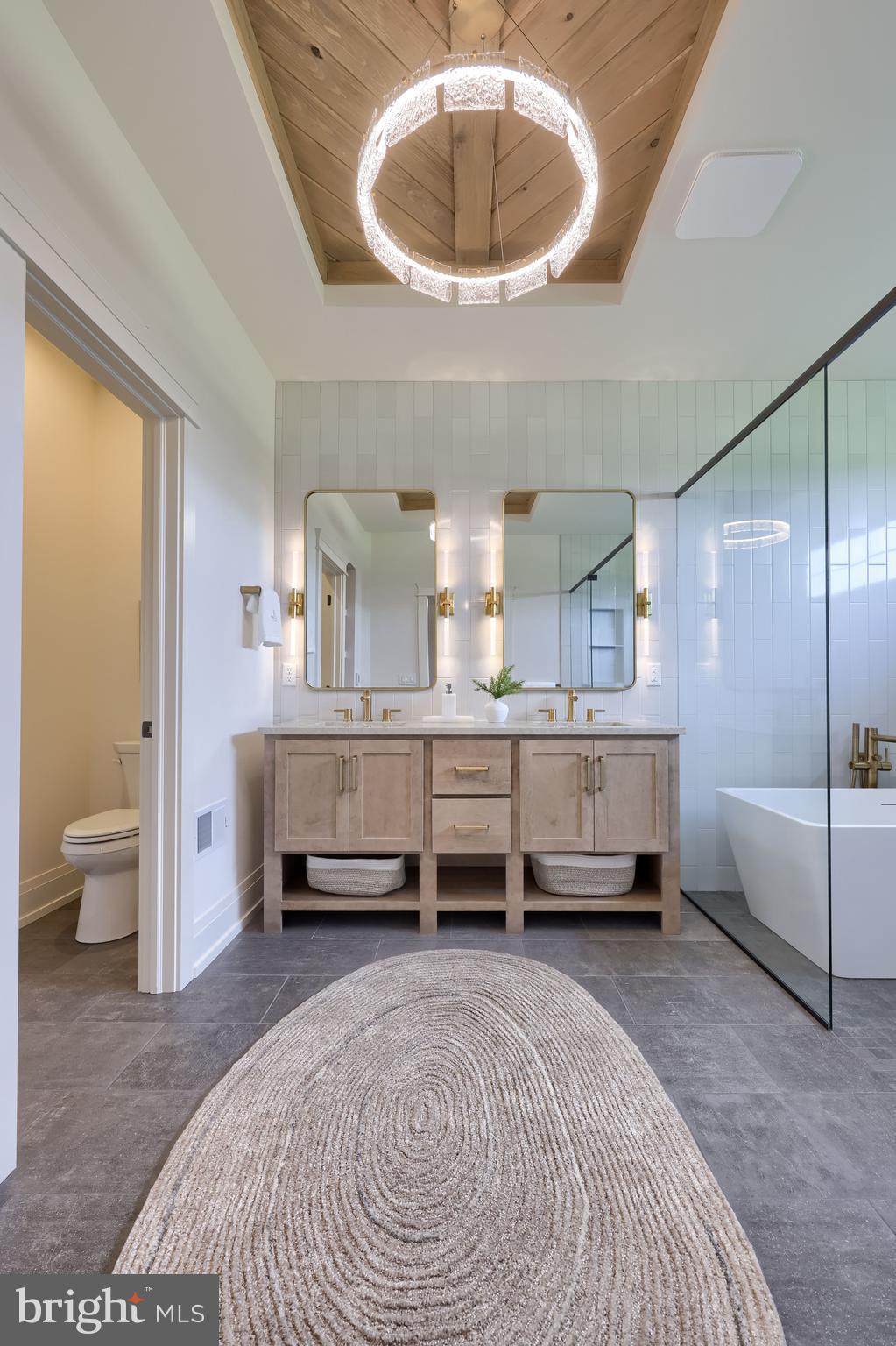 3 Balsam Lane Lititz, PA 17543 - Photo 48 of 52 a bedroom with a bed a lamp and a large window