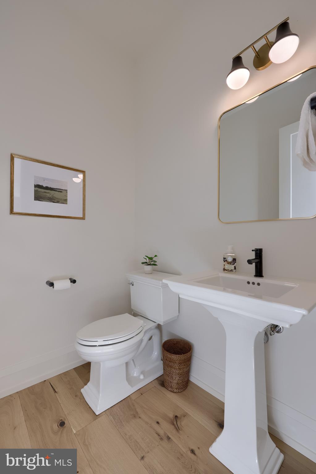 3 Balsam Lane Lititz, PA 17543 - Photo 5 of 52 a bathroom with a toilet a sink and mirror