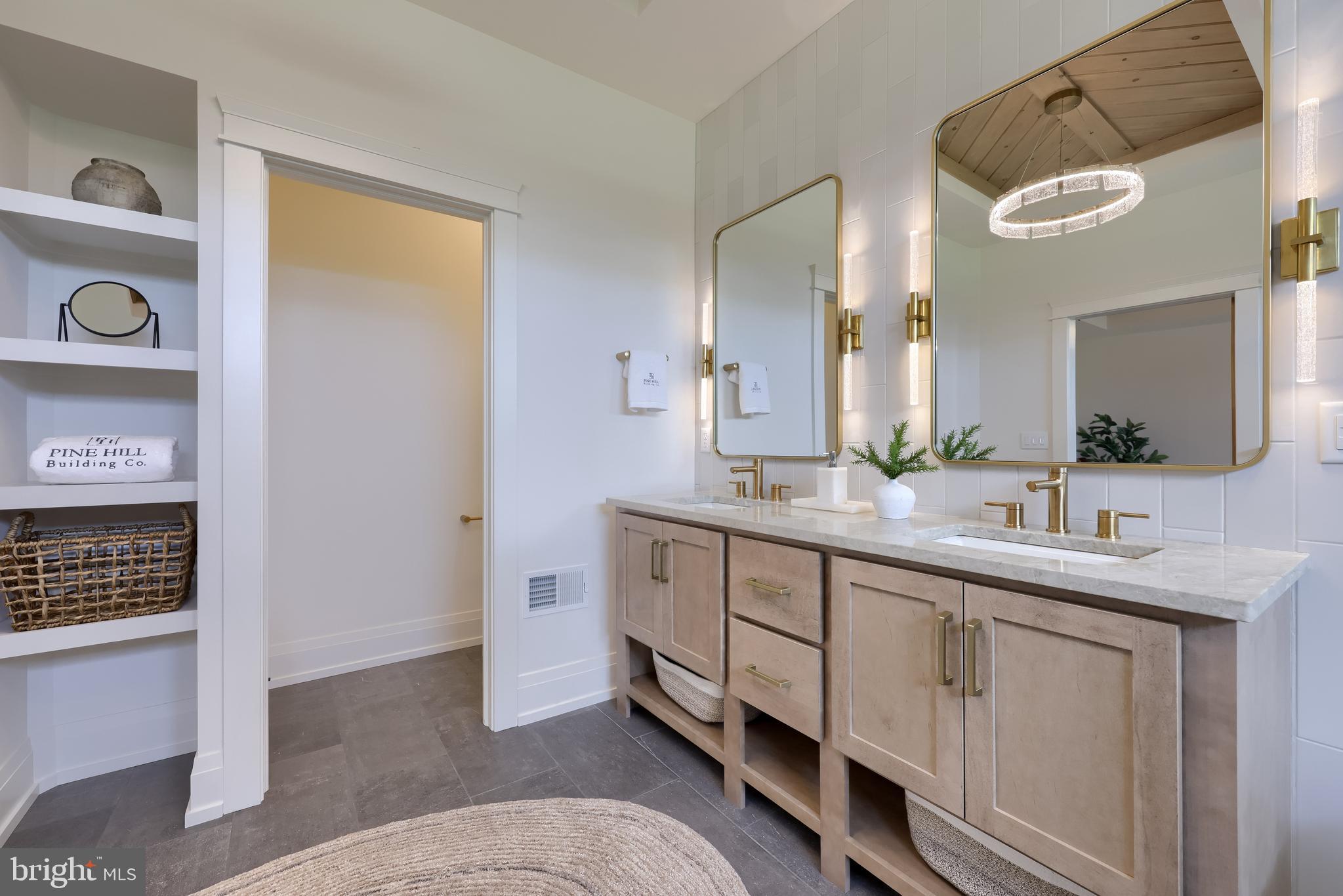 3 Balsam Lane Lititz, PA 17543 - Photo 51 of 52 a spacious bathroom with a double vanity sink and a mirror