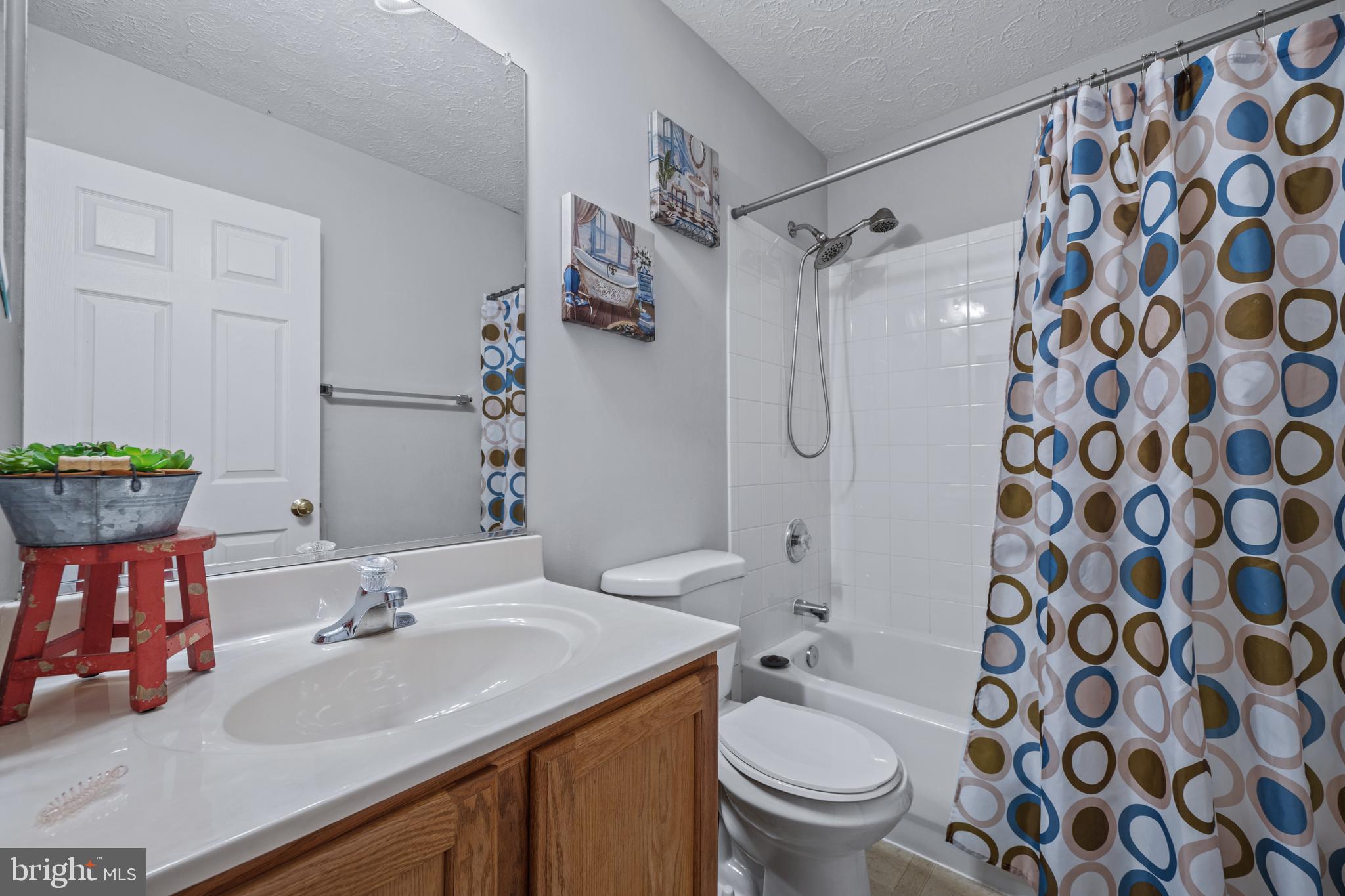 2961 Raking Leaf Drive Abingdon, MD 21009 - Photo 17 of 28 a bathroom with a sink toilet and shower