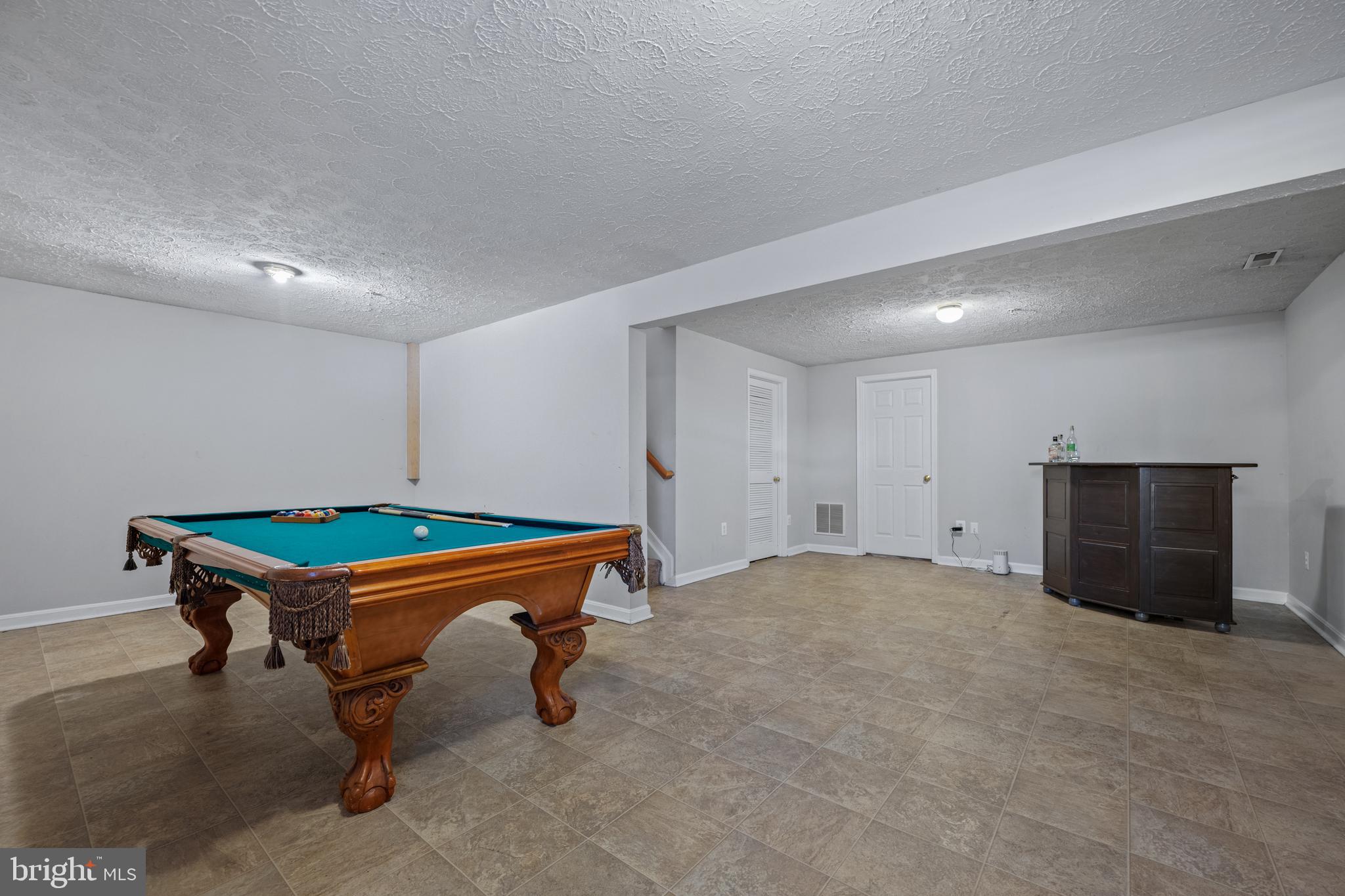 2961 Raking Leaf Drive Abingdon, MD 21009 - Photo 21 of 28 a room with pool table and windows