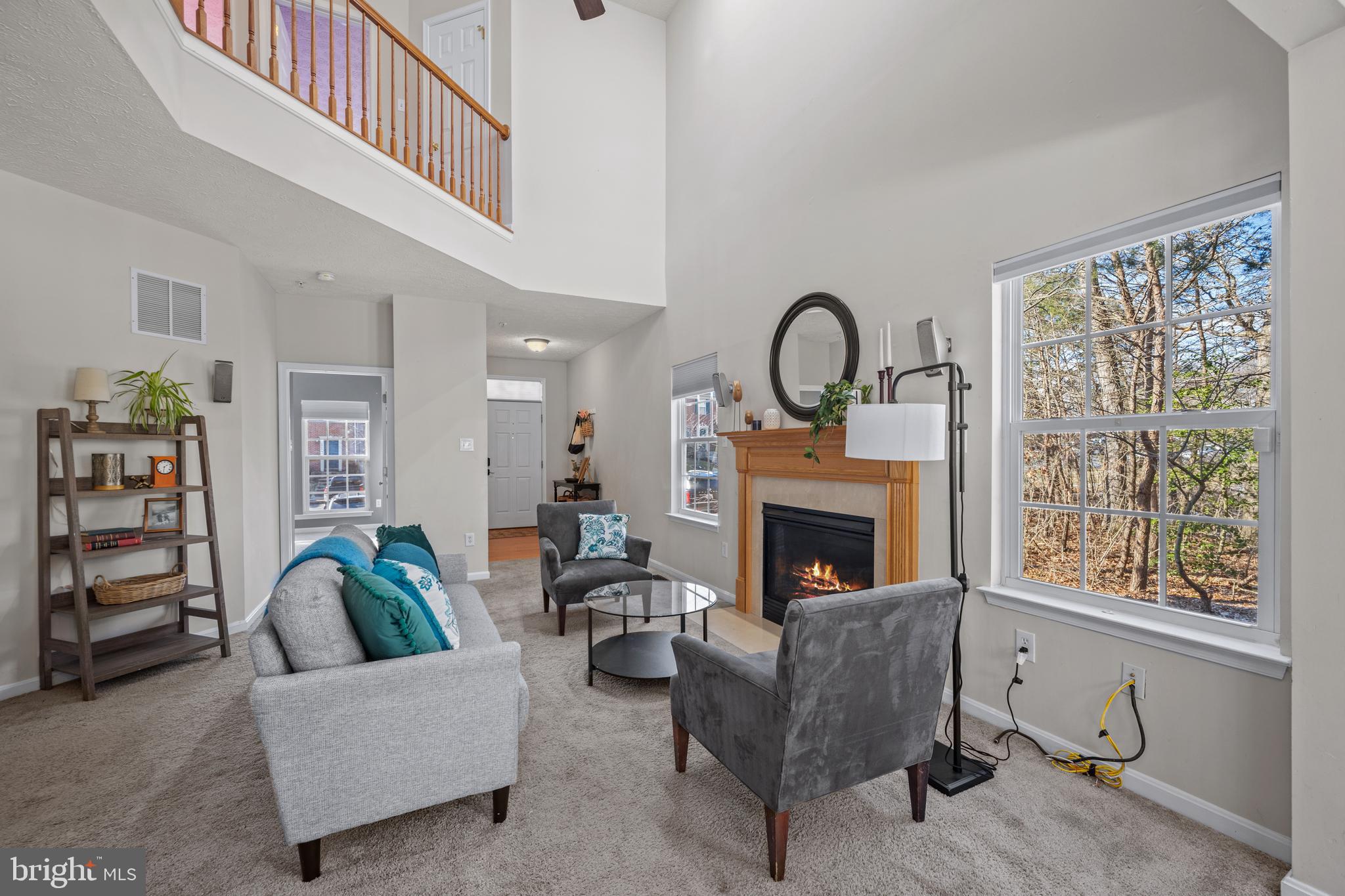 2961 Raking Leaf Drive Abingdon, MD 21009 - Photo 8 of 28 a living room with furniture and a fireplace