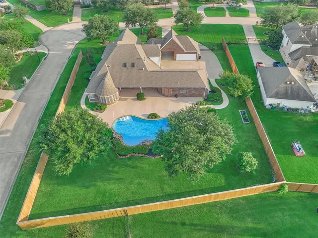 a view of a swimming pool with an outdoor space and seating area