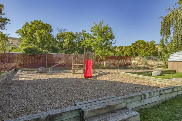 a view of street with sitting area