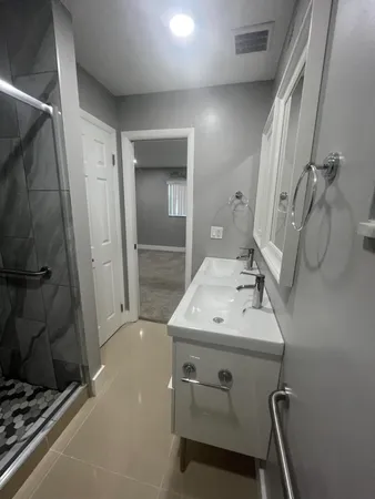 a utility room with cabinets