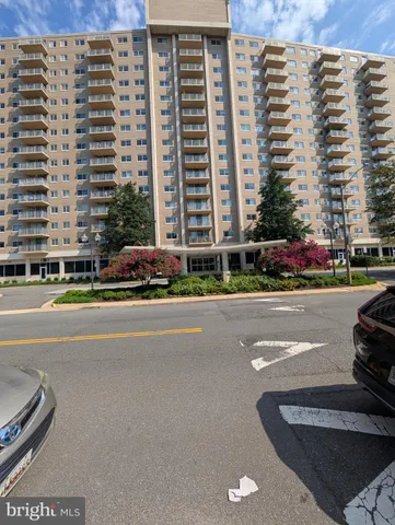 a front view of a building with a street