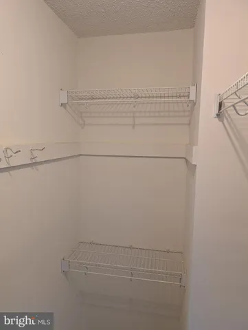 a bathroom with a sink a vanity and a mirror