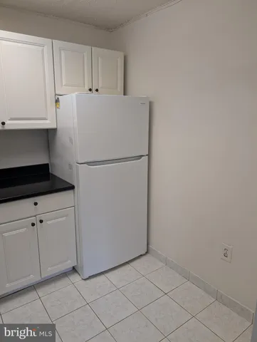 a view of a swimming pool and an outdoor space