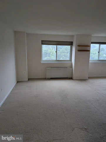 an empty room with a window