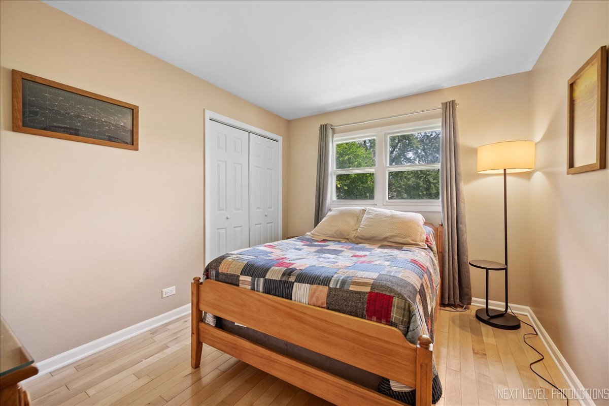4N636 Klein Road West Chicago, IL 60185 - Photo 15 of 36 a bedroom with a bed and a window