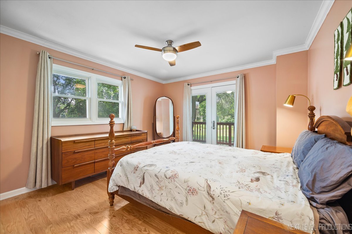 4N636 Klein Road West Chicago, IL 60185 - Photo 16 of 36 a bedroom with a bed and a large window with the outer view
