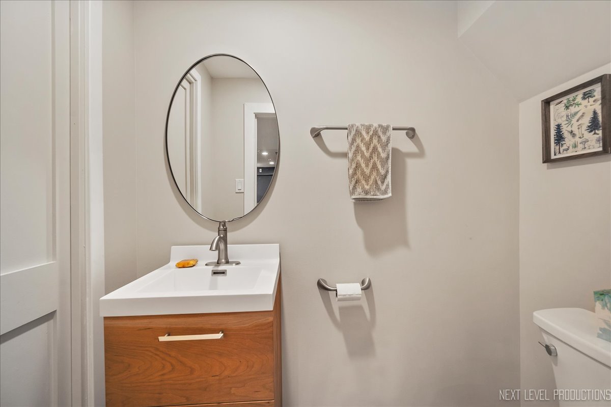 4N636 Klein Road West Chicago, IL 60185 - Photo 20 of 36 a bathroom with a sink and a mirror