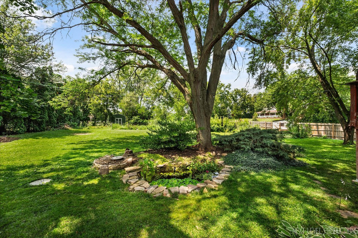 4N636 Klein Road West Chicago, IL 60185 - Photo 27 of 36 a view of a green field with lots of bushes
