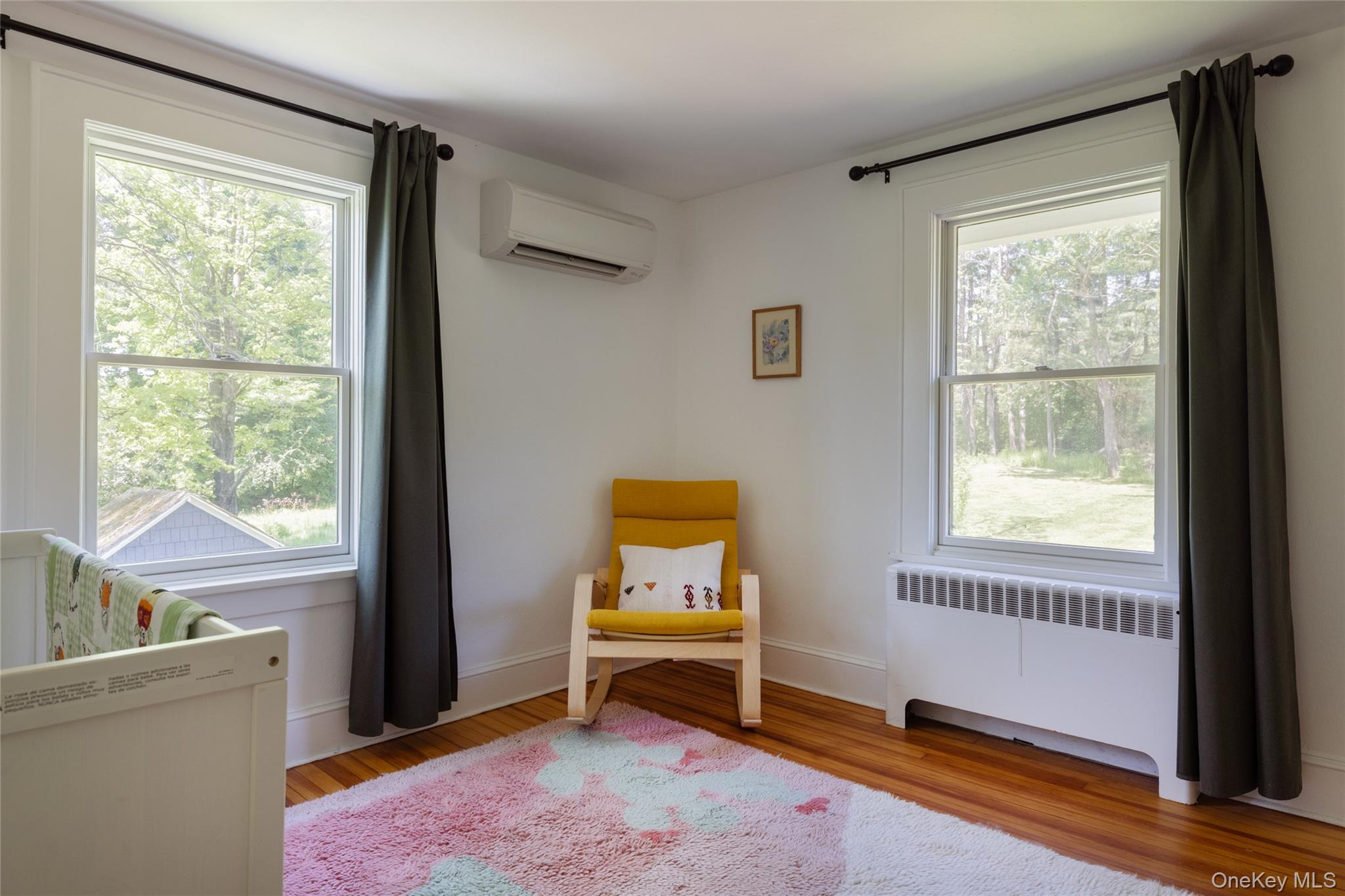 185 Verbank Village Road Millbrook, NY 12545 - Photo 17 of 22 a bedroom with a window and bed