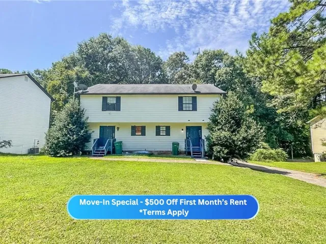 a view of a house with a swimming pool