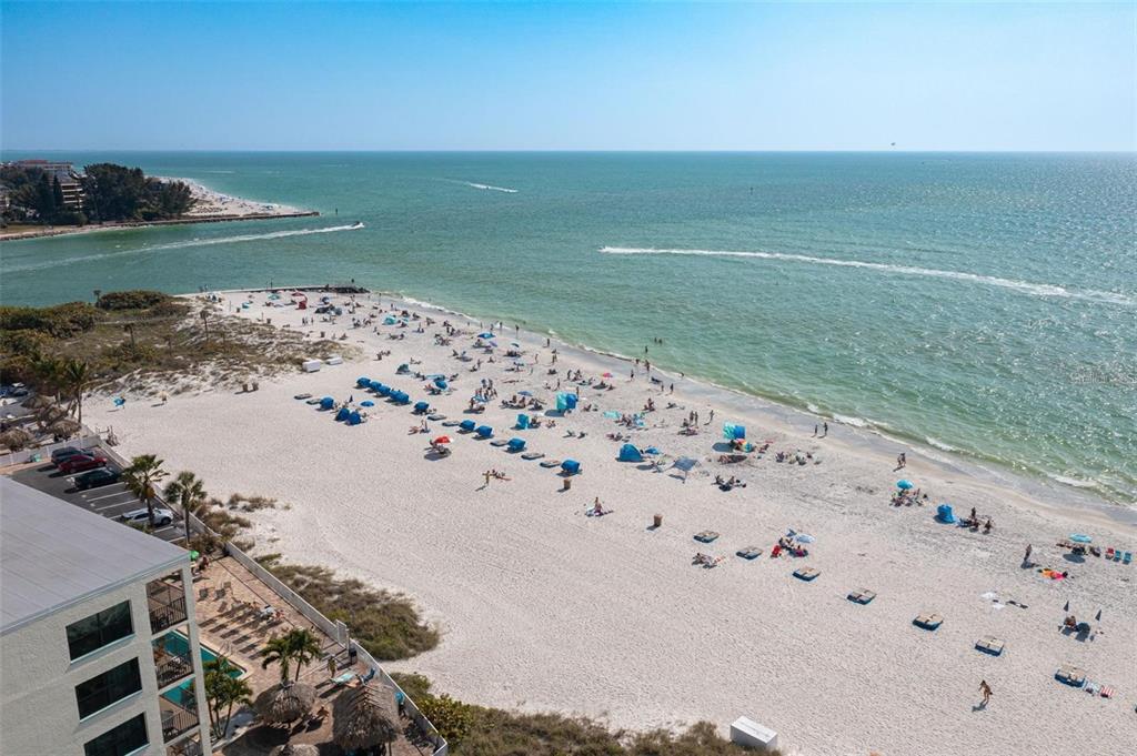 12924 Gulf Boulevard, Unit 510 Madeira Beach, FL 33708 - Photo 18 of 61 a view of a lake with a big yard