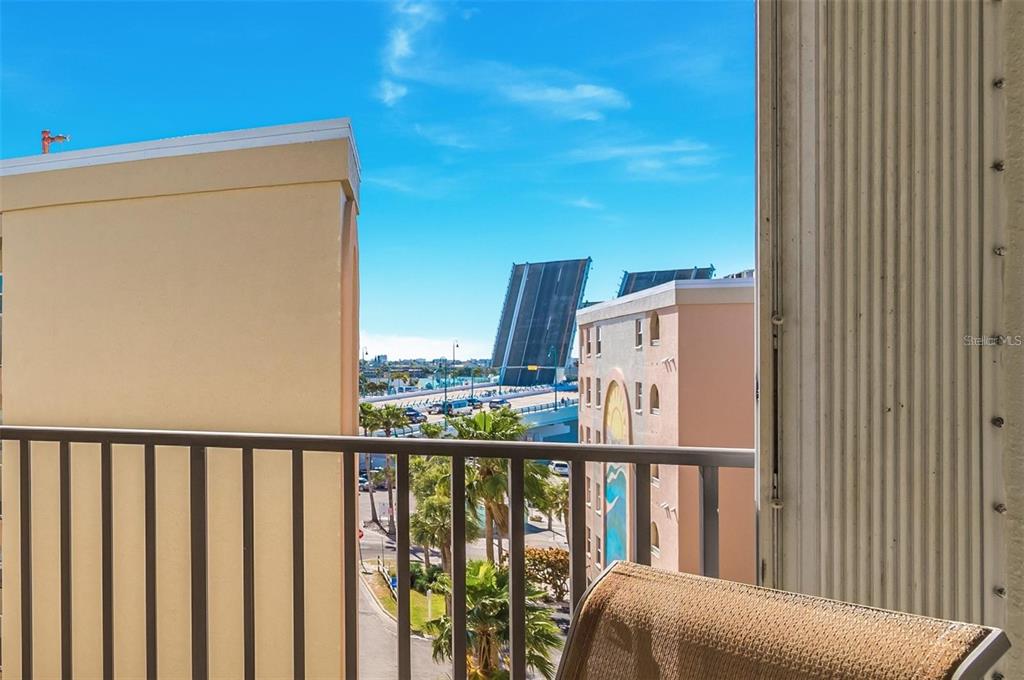 12924 Gulf Boulevard, Unit 510 Madeira Beach, FL 33708 - Photo 19 of 61 a view of a balcony with furniture