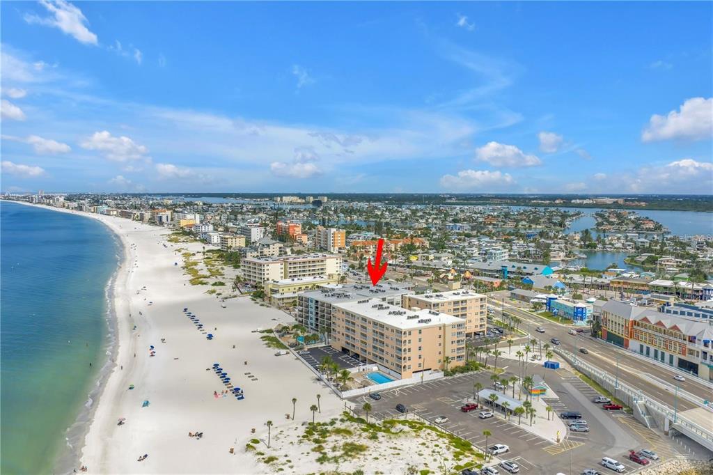 12924 Gulf Boulevard, Unit 510 Madeira Beach, FL 33708 - Photo 57 of 61 a view of roof with city view