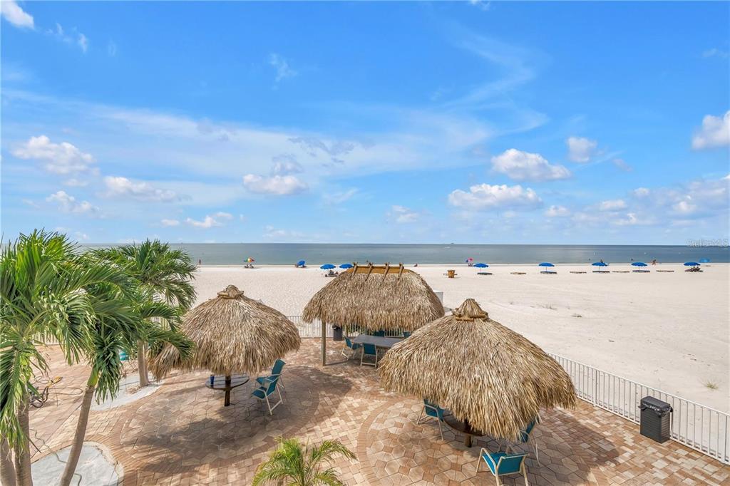 12924 Gulf Boulevard, Unit 510 Madeira Beach, FL 33708 - Photo 60 of 61 a view of an ocean and beach