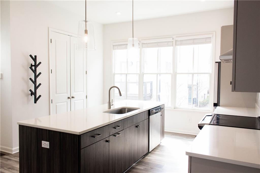 728 Perch Place Atlanta, GA 30312 - Photo 14 of 19 a kitchen with a sink cabinets and window