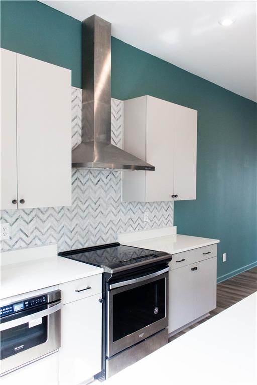728 Perch Place Atlanta, GA 30312 - Photo 16 of 19 a kitchen with a stove and a sink