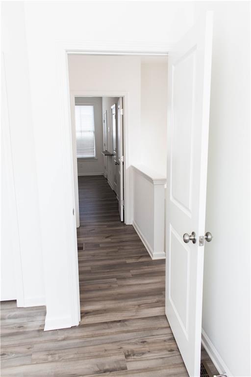 728 Perch Place Atlanta, GA 30312 - Photo 19 of 19 a view of a hallway with wooden floor