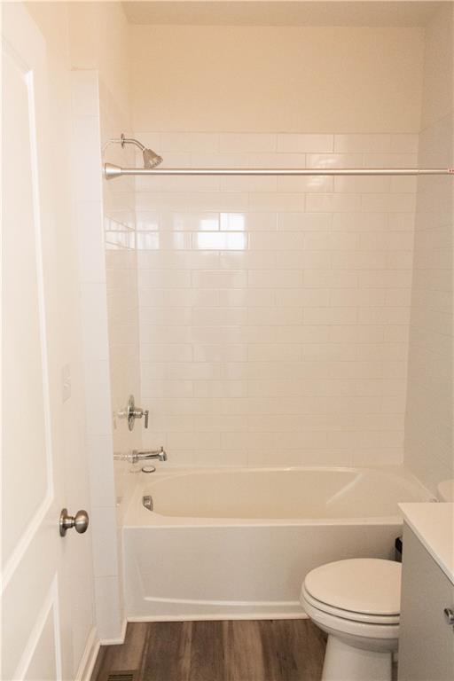 728 Perch Place Atlanta, GA 30312 - Photo 3 of 19 a bathroom with a shower a toilet and sink