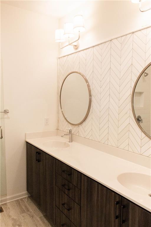 728 Perch Place Atlanta, GA 30312 - Photo 5 of 19 a bathroom with a sink and a mirror