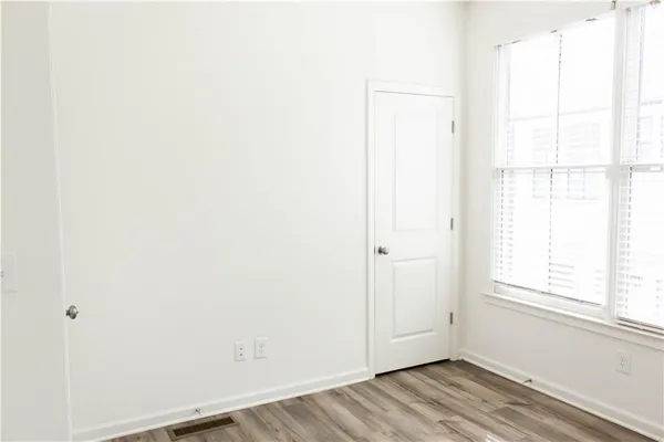 a view of a room that has a window in it