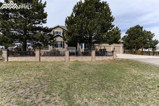 42745 Pearson Ranch Loop Parker, CO 80138 - Photo 2 of 36 Front of House/Courtyard