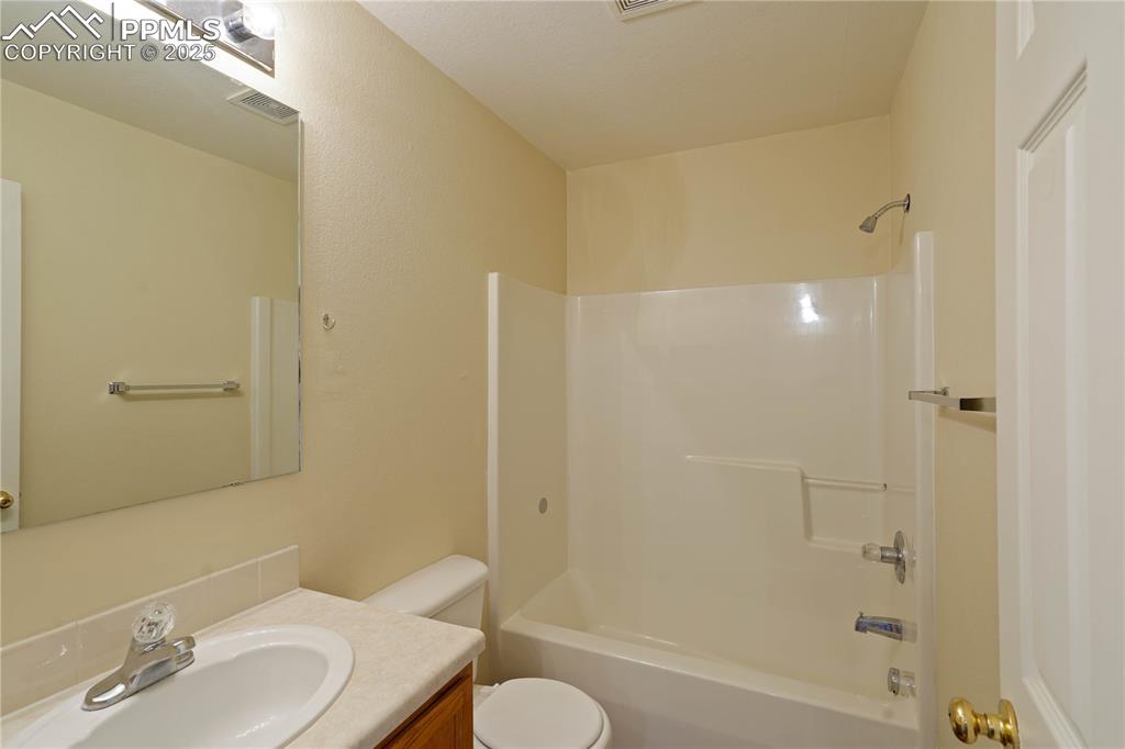 4400 Rawhide Road, Unit 157 Pueblo, CO 81008 - Photo 10 of 19 a bathroom with a sink toilet and shower