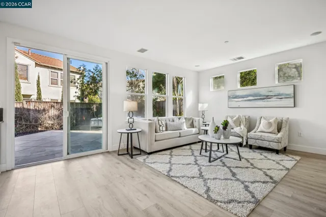 a view of a kitchen and dining room