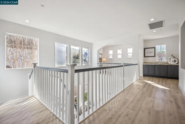 a view of a patio with couches and a fire pit