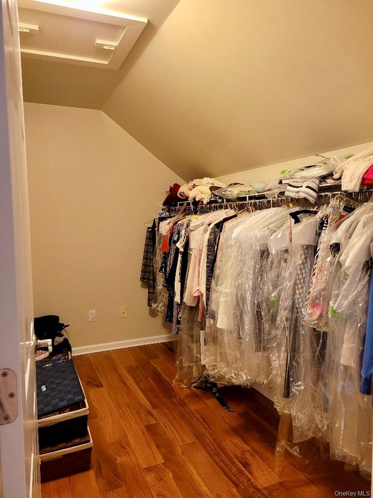 2003 Half Moon Bay Drive, Unit 2003 Croton-on-Hudson, NY 10520 - Photo 20 of 33 a walk in closet with clothes and shoes