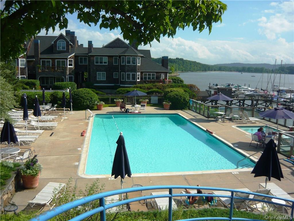 2003 Half Moon Bay Drive, Unit 2003 Croton-on-Hudson, NY 10520 - Photo 27 of 33 a view of a swimming pool with a patio