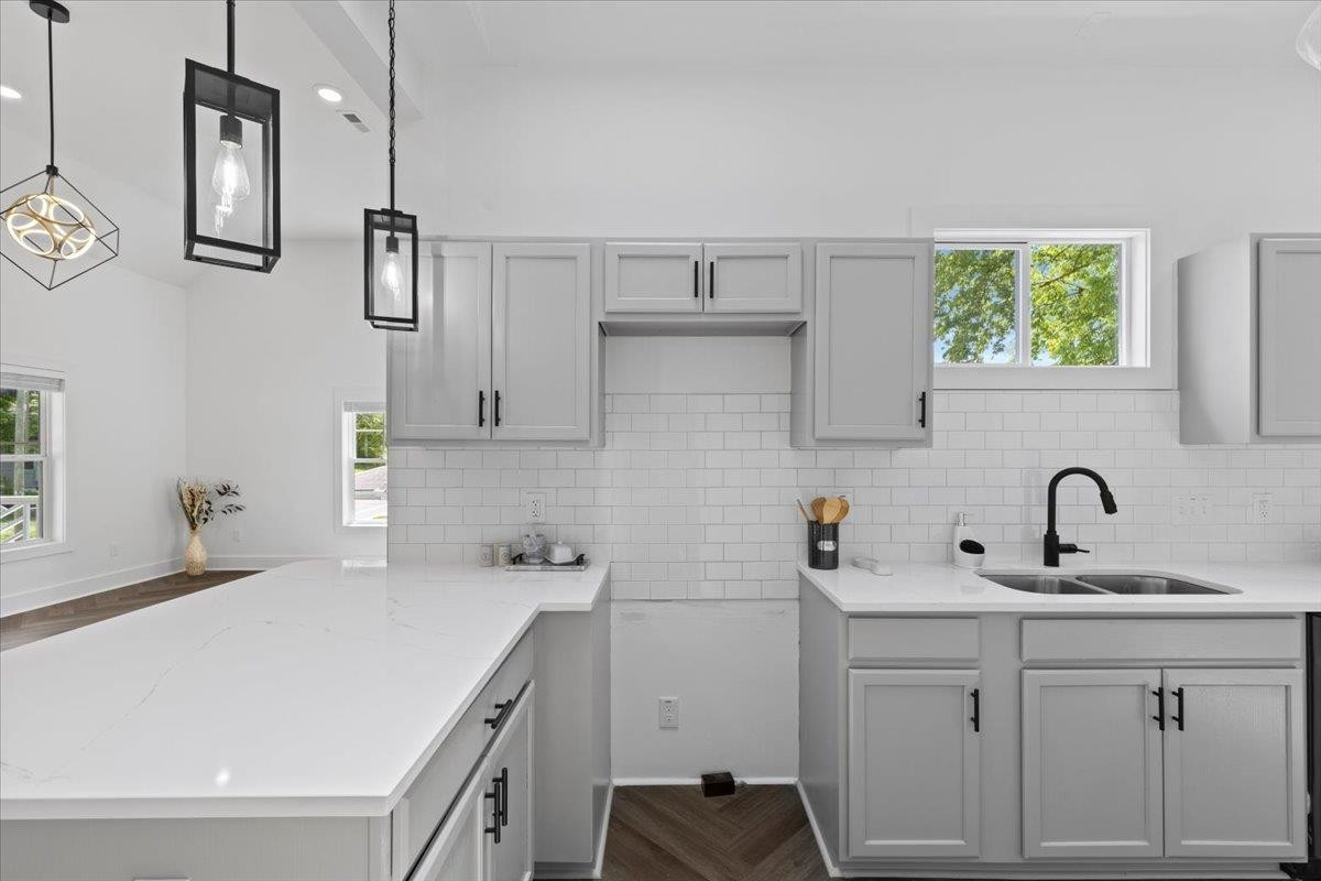 1506 Chapel Hill Road Durham, NC 27701 - Photo 15 of 50 a kitchen with a sink cabinets and window